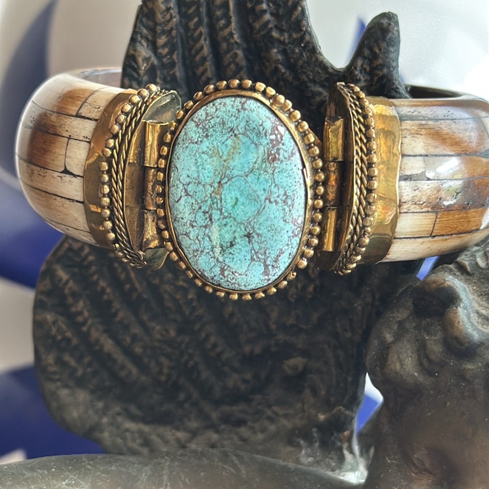 Large vintage oval turquoise and brass inlaid bone cuff with interesting clasp